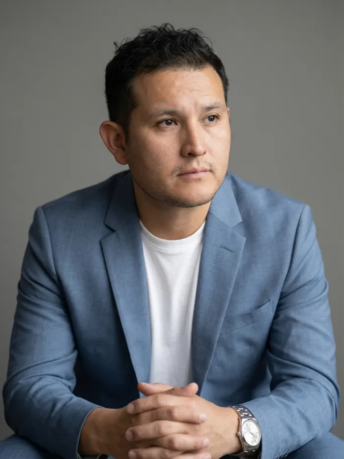 Dennis Alejo in a light blue blazer
